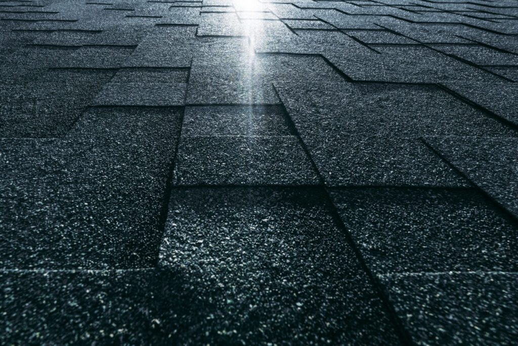 closeup of roof with light shining across