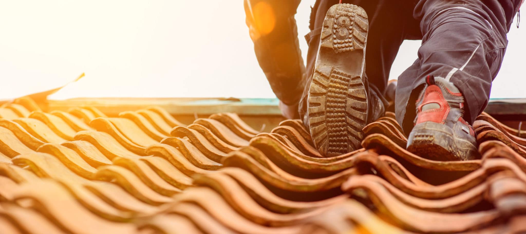 boot climbing on roof