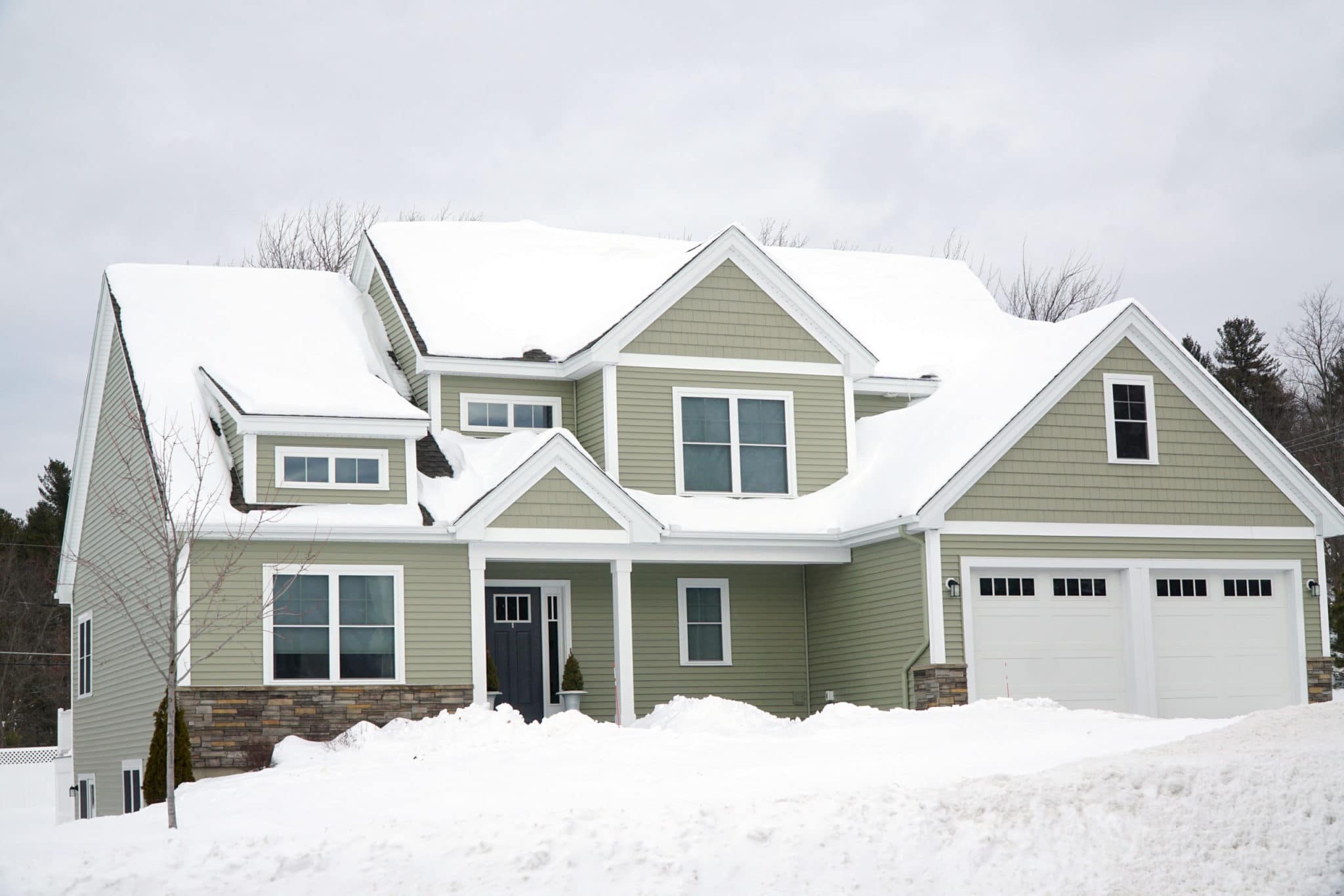 residential house after snow storm in winter